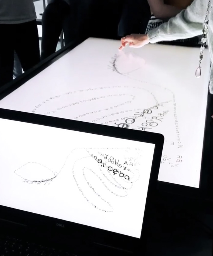 touch screen with waves of interactive letters