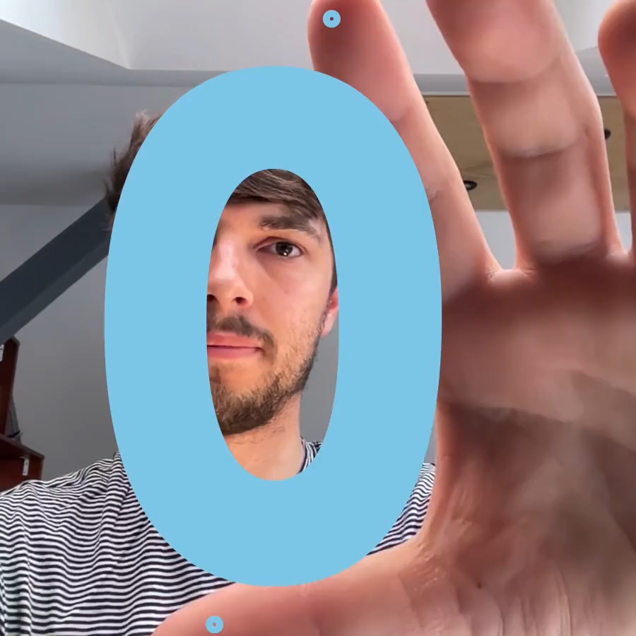 a blue numeral 0 is scaled between the thumb and index finger with body tracking