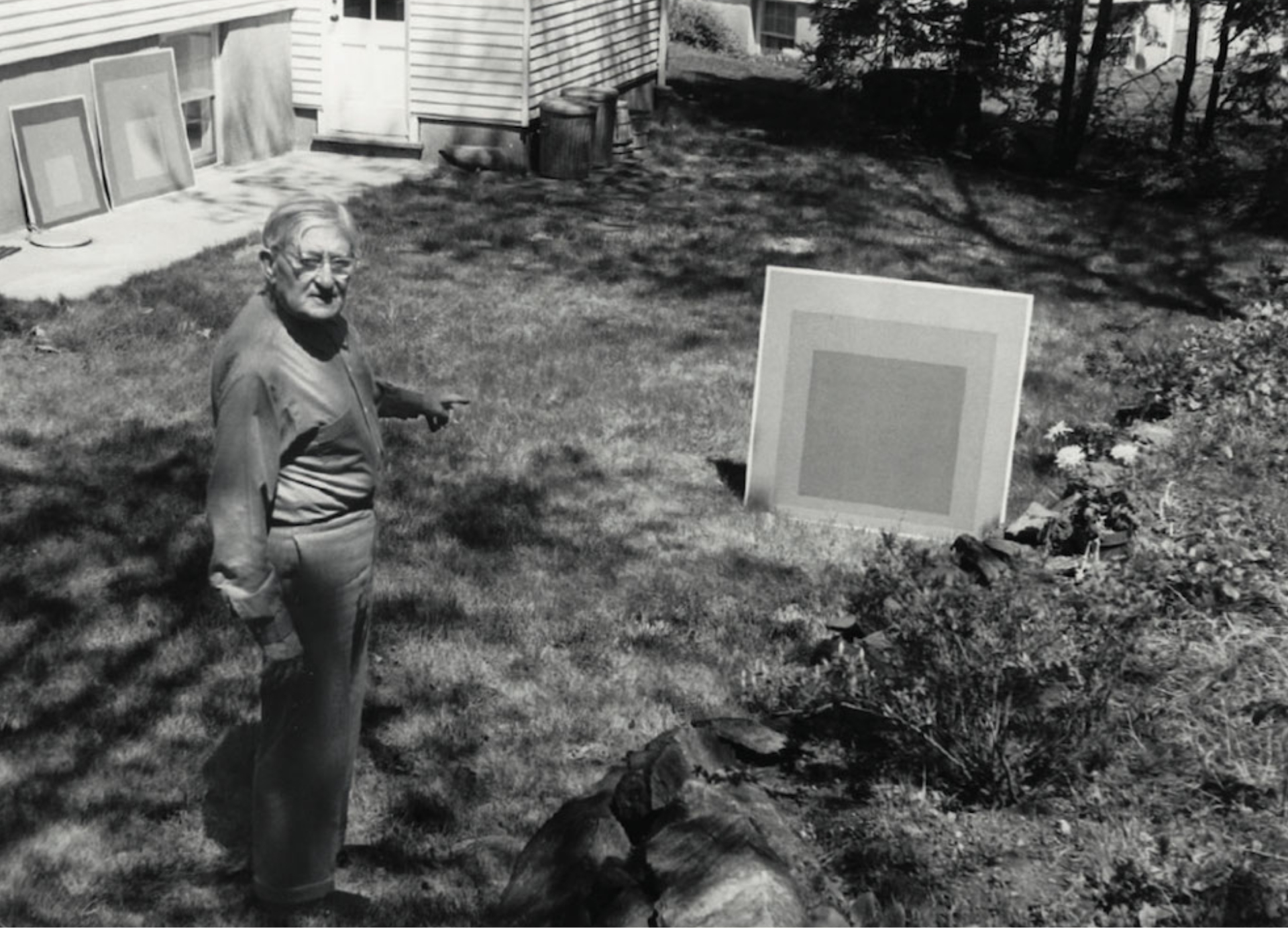 Josef Albers with one of his Homage to the Square paintings, ca. 1965. Photo: Walter Rüdel.