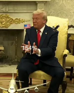 Donald Trump with tariff numbers between his hands following his gestures.